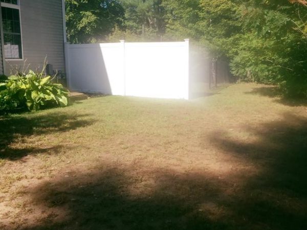 Derry NH storm cleanup job after photo, with with lawn care all completed.