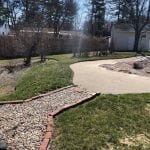 Recently our landscapers in goffstown NH completed this back yard landscaping service. There are two walkways, one made of rocks and the other with concrete.