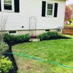 Close up of a gardening service in Manchester NH after plant installation, edging, mulching and lawn mowing.